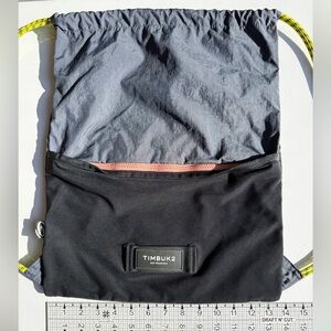 Timbuk2 nylon drawstring bag.